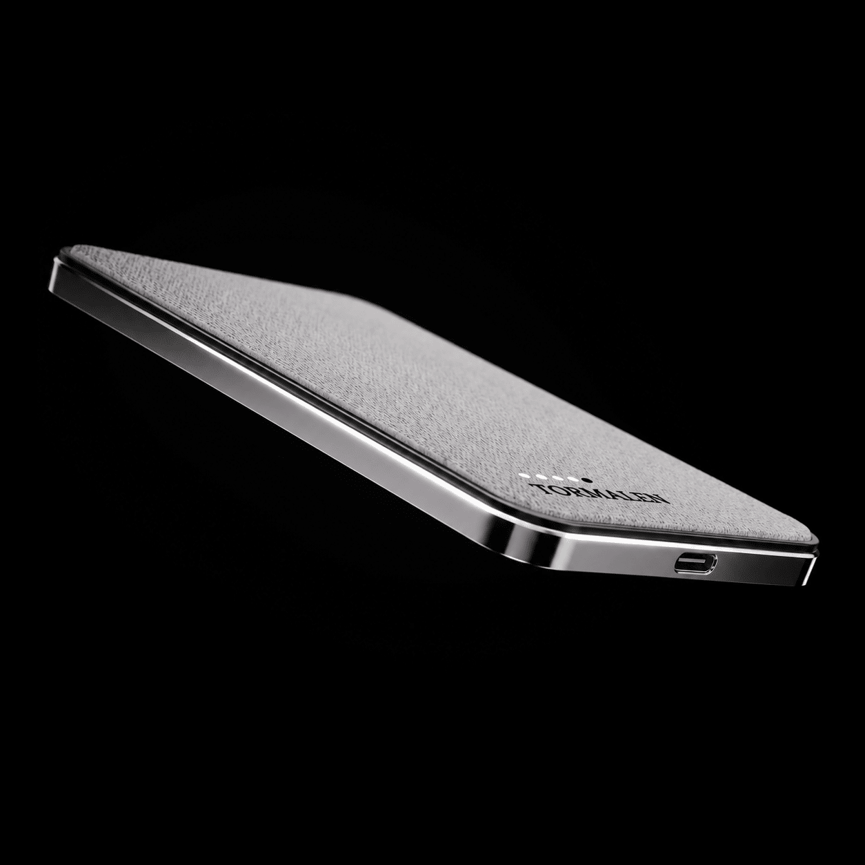 Side profile of TORMALEN power bank showing 6.7mm thickness